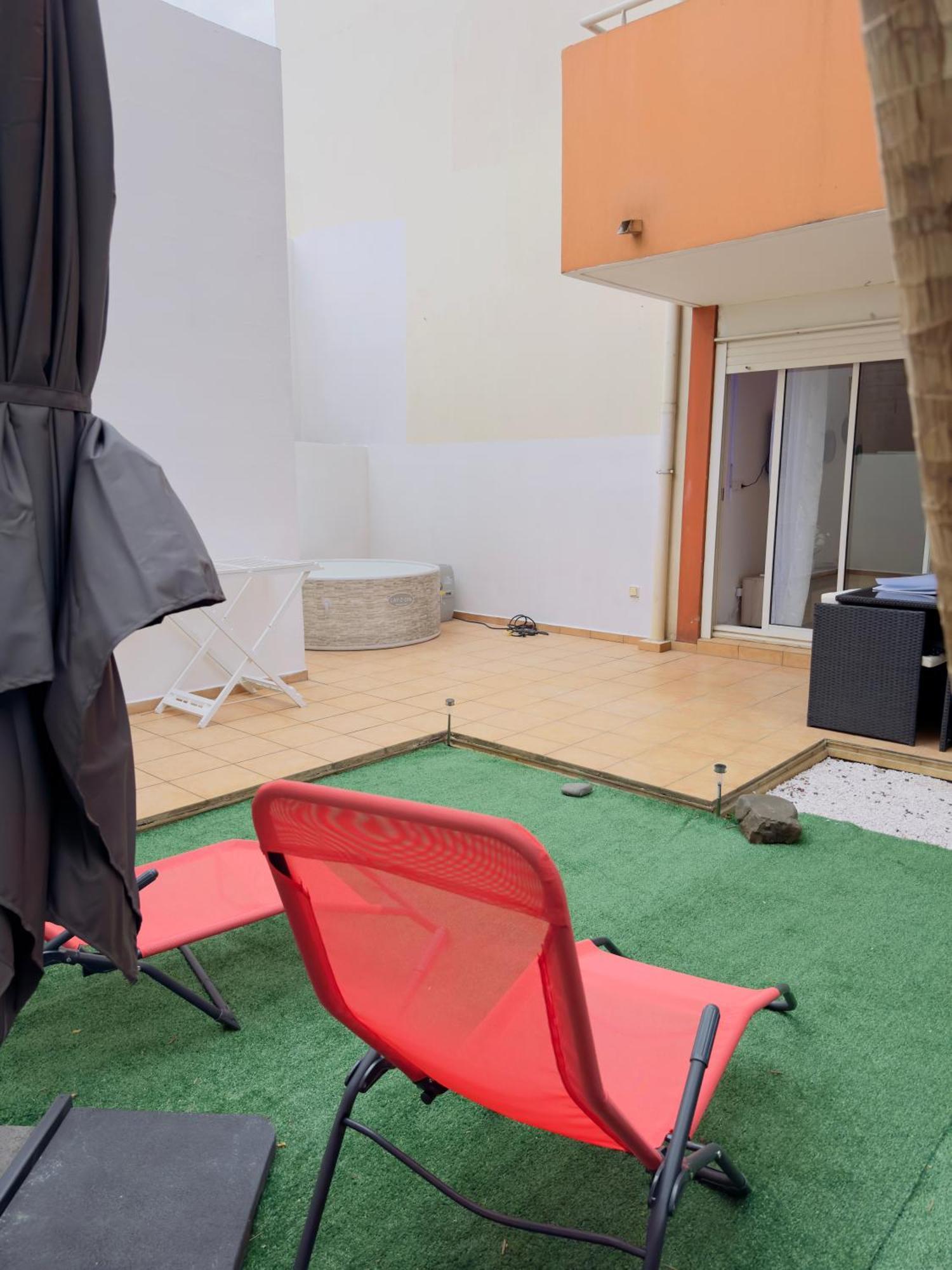 Le Petit Oasis Apartment Сен Дьони Екстериор снимка